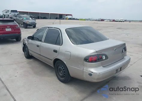 1999 Toyota Corolla Ce из США, поврежденный, VIN 1NXBR12E9XZ159403
